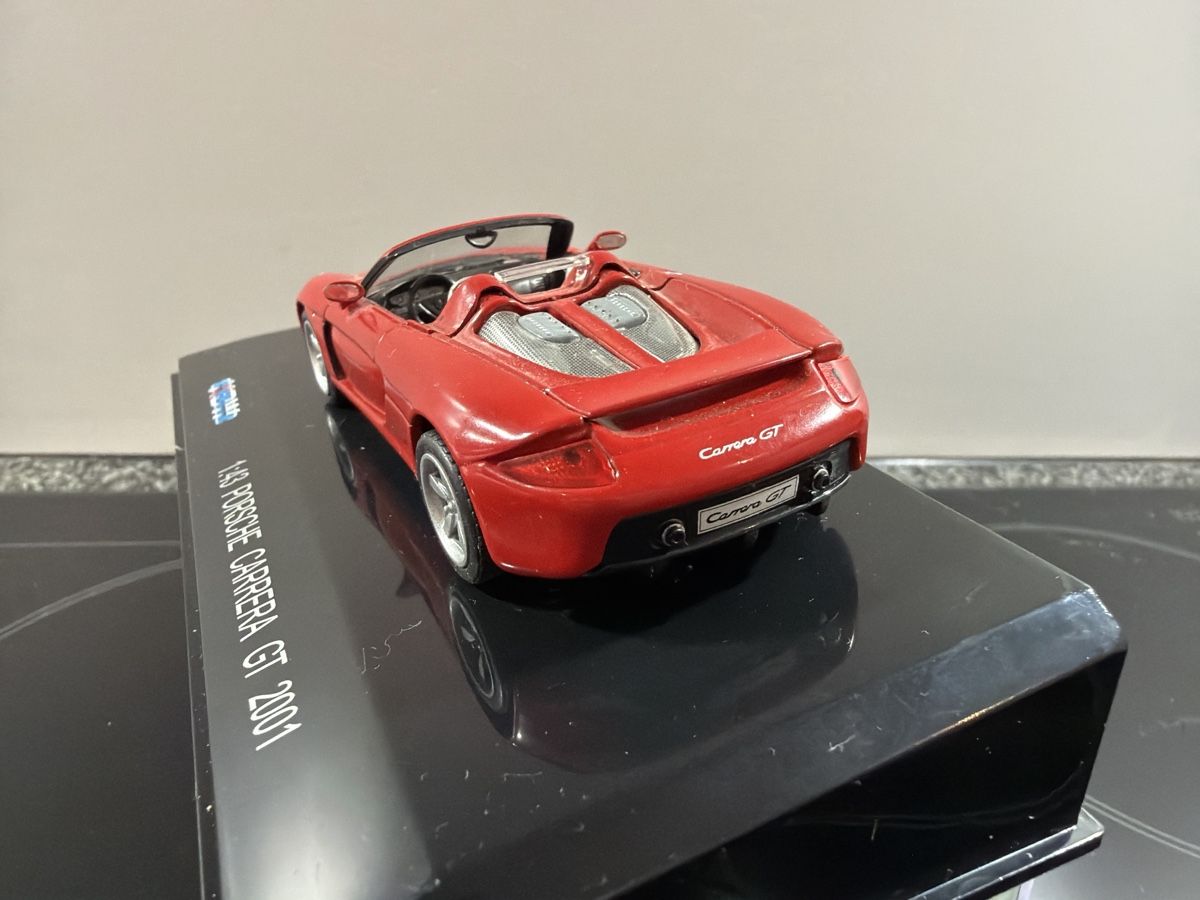 Modellini d'auto: Porsche Carrera GT rot - KDW – Nuovo e nell'imballaggio originale da Wolfwil venduto da Rolex1 2