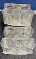 Eine set von Achtzehn verpackte Glasbecher