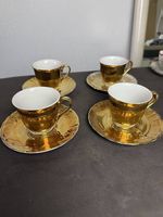 4 goldene Espressotassen mit Untertassen, Italien, Porzellan