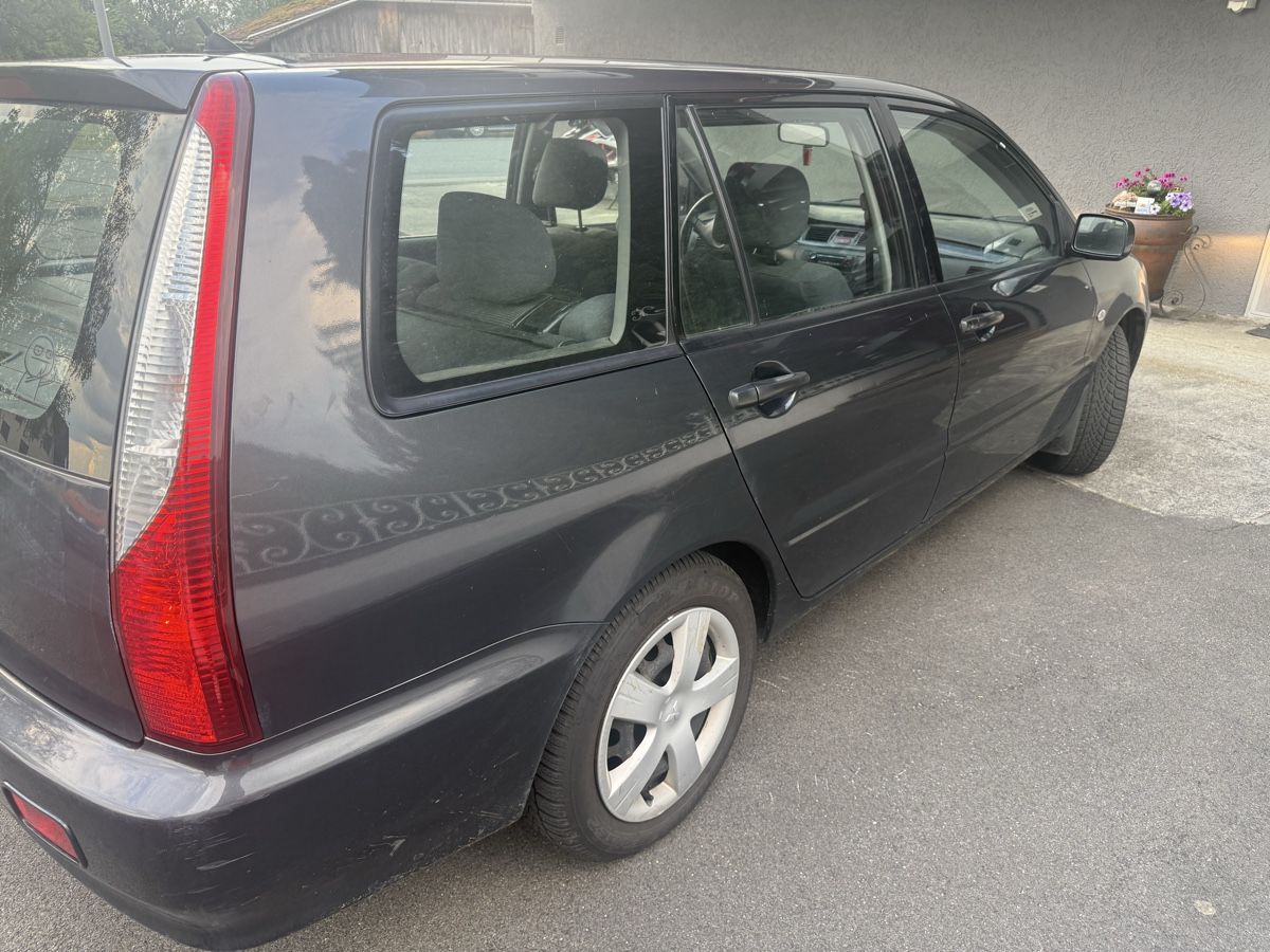 Mitsubishi Autos: Mitsubishi Lancer Kombi 1.6 Comfort – Gebraucht aus Oberriet SG von TipTop-R 1
