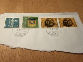 vier alte Briefmarken 