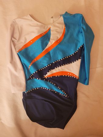 🏷️ À vendre : Magnifique justaucorps de gymnastique 10 ans