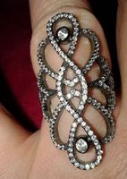Tres jolie bague en Argent et avec des zircons