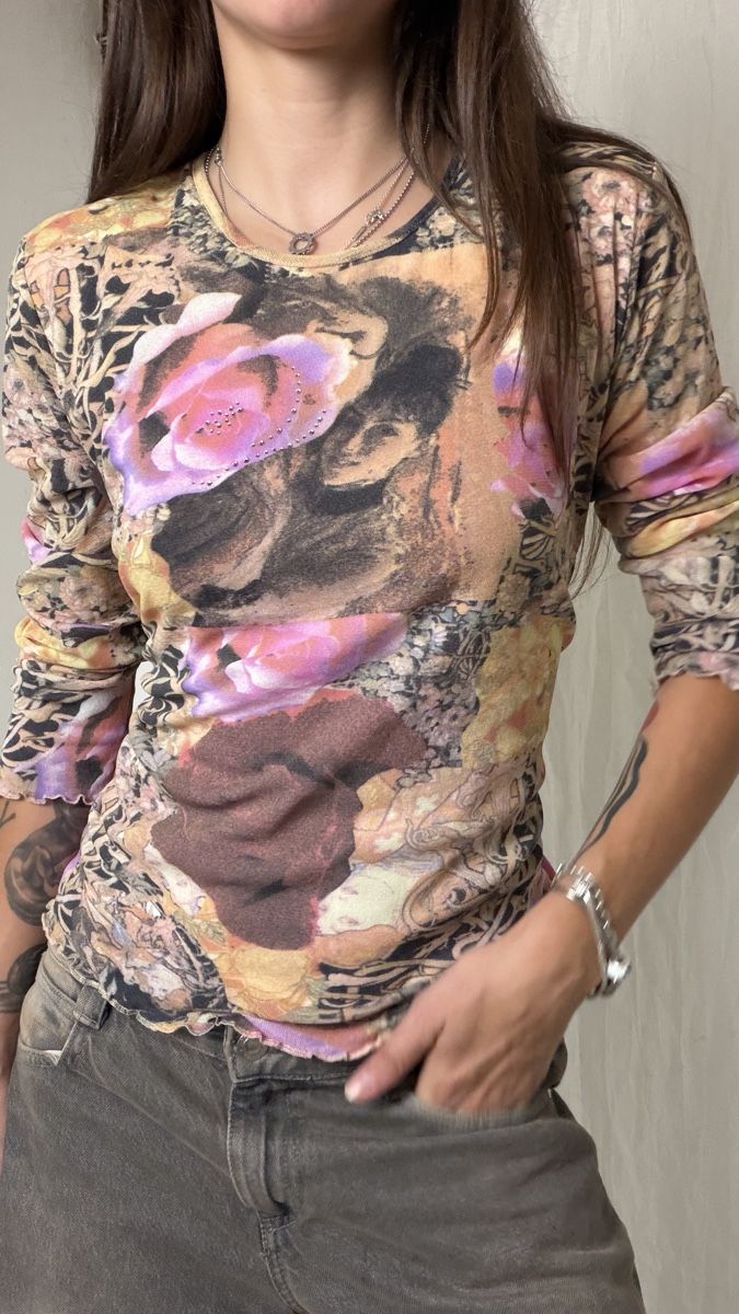Top: Vintage Y2K mesh top – Usato da Knonau venduto da Grapesvintage 2