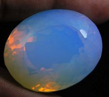 Certified 53.60 Ct Opal Blue Yellow Fire Extremely Oval Cut