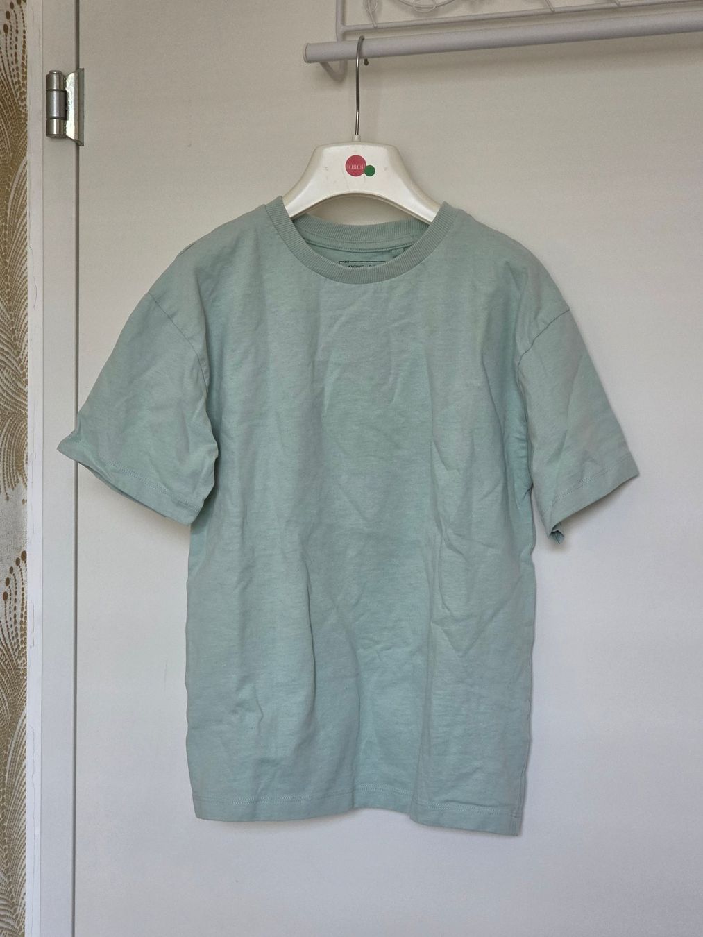 Next Chemises, T-shirts & Polos: mintfarbenes T-Shirt Gr. 128 – D'occasion à Zürich par Londonista