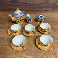 Teeservice aus Porzellan, 8-teilig