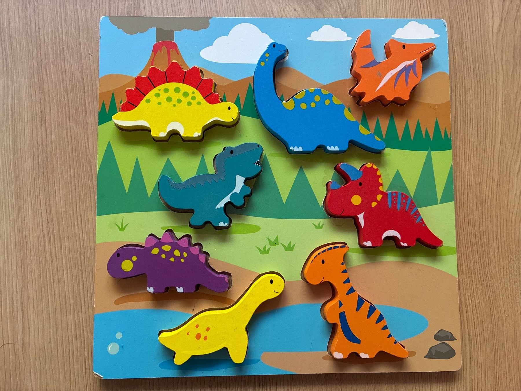 Puzzles: Holzpuzzle mit 8 Dinosaurier – D'occasion à Eggenwil par mic_b5l2