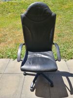 Chaise de bureau cuir noir roulettes bon état