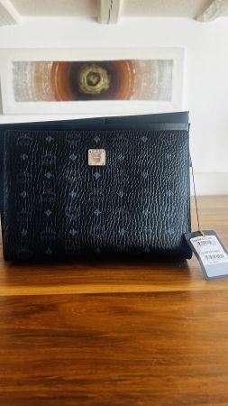Elegante MCM Clutch in Schwarz - Neuwertig