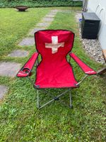 Foldable camping chair with Swiss design and carrying bag
