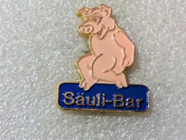 Ansteckpin 64: Säuli Bar