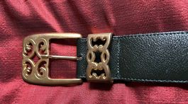 Green leather belt with gold buckle