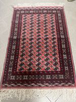 Tapis oriental fait main 