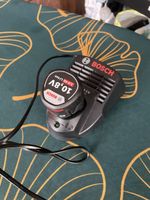 Bosch Ladegerät AL 1115 CV inklusive 10,8 V Akku 2,0 Ah