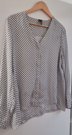 Chemise à motifs blancs et noirs taille XL état neuf