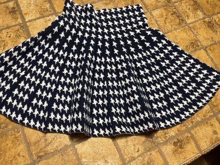 Gonna a maglia a pieghe pied de poule, elegante!