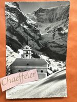Grindelwald Kirche mit Fiescgerhörner.  um 1935