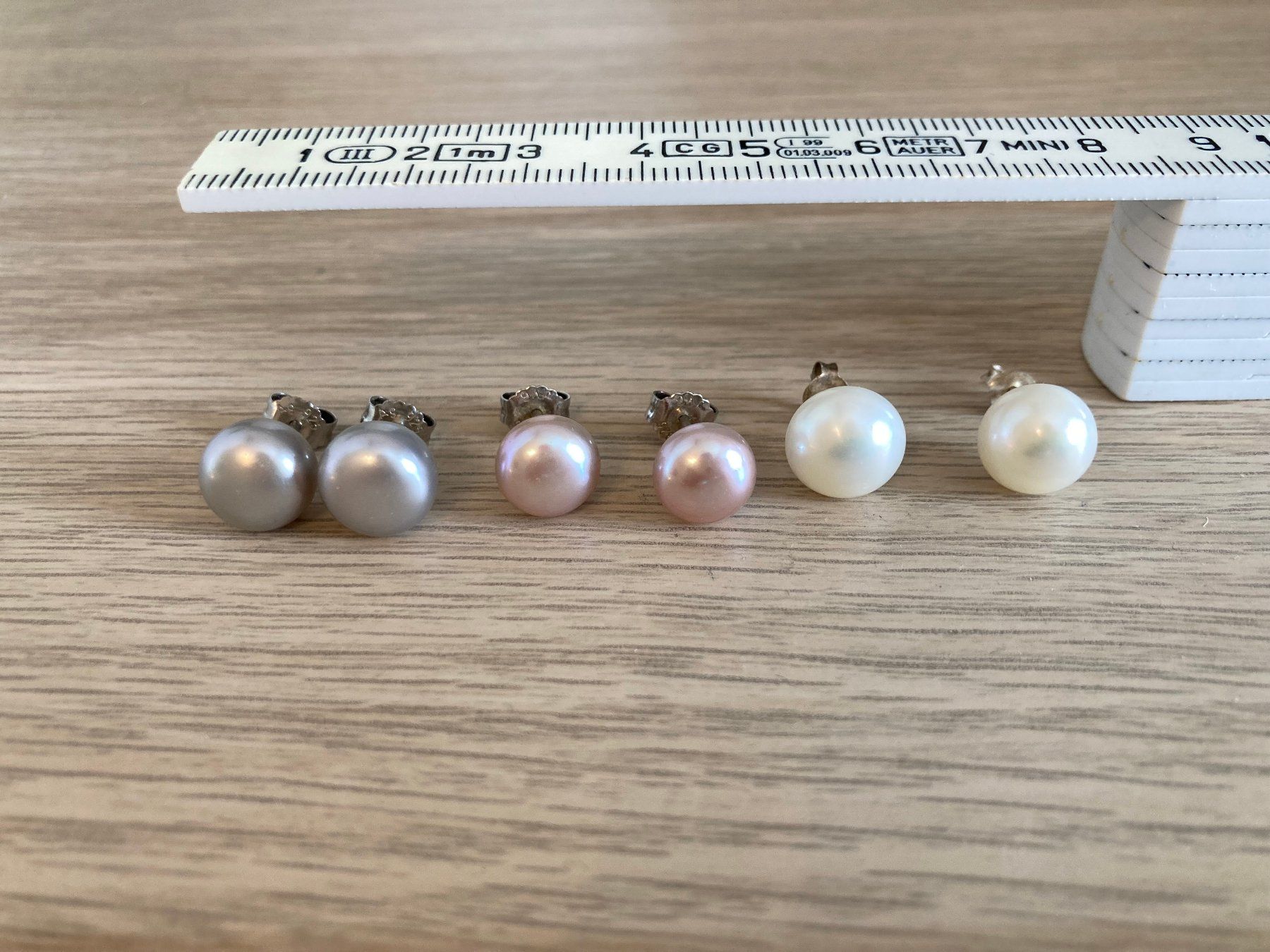 Autres bijoux: Perlenohrenstecker Rhomberg – D'occasion à Niederdorf par Anderlemon