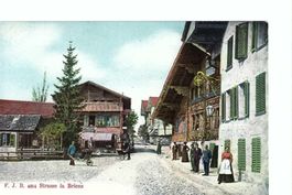 Brienz, Trachtenfrau und Leute auf Strasse; F.J.B