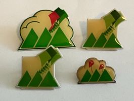 4 Pin Drachen über Bergen