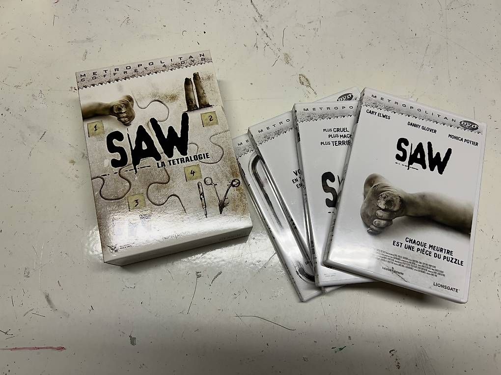 Tutti i DVDs: Coffret DVD Saw – Usato da Lavigny venduto da bassposaune78 1