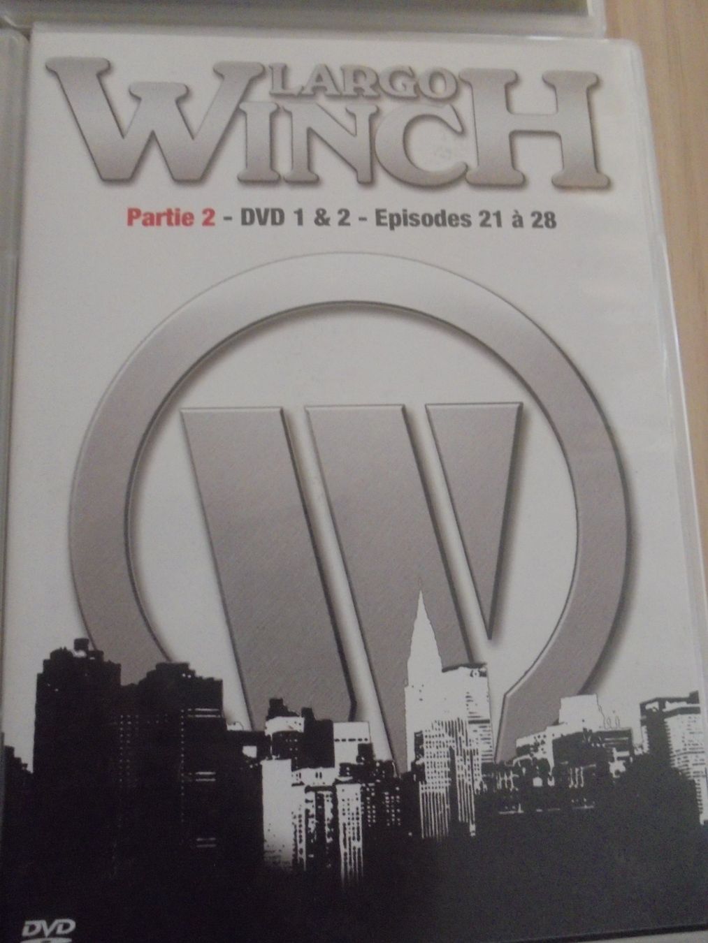 Tutti i DVDs: " Largo Winch, épisodes 1 à 28 " 7 DVD comme neufs – Usato da Crissier venduto da Promopost 4
