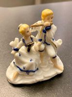 Alte Porzellanfigur, Mann mit Flöte