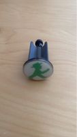 Stöpsel mit grünem Berliner Ampelmännchen