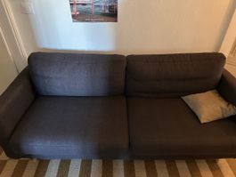 Canapé gris confortable