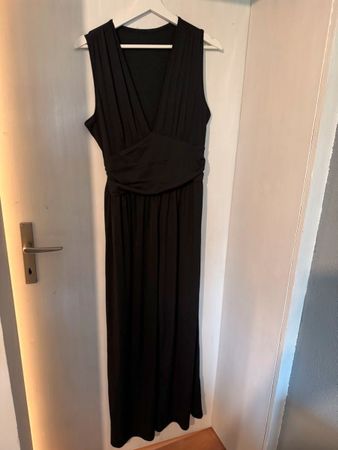 Jumpsuit noire jambe large tissu côtelée L