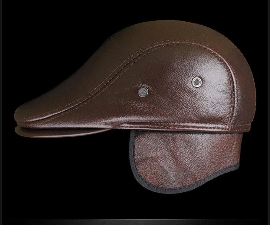 Copricapi, berretti & cappellini: Baskenmütze aus Leder mit Ohrenschutz – Nuovo e nell'imballaggio originale da Lausanne venduto da FASHION-WORLD-SHOP