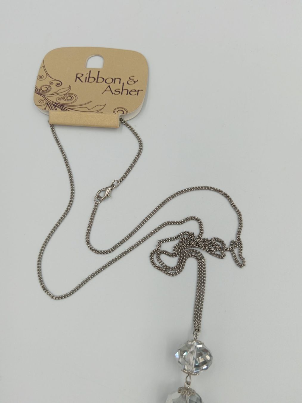 Colliers: Lange Modeschmuck-Halskette, silberfarben mit Quaste – Neuf avec emballage d'origine à Bäch SZ par Swissy46 4