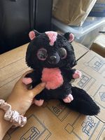 Schwarzer Stinktier-Panther mit Rosa Glitzeraugen