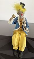 Clown mit Katze klein mit Stoffbeinen 