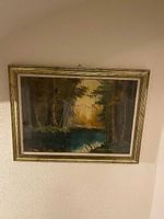 Schönes Bild mit goldigem Rahmen