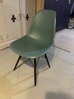 Chair plastic seat green wooden legs good condition