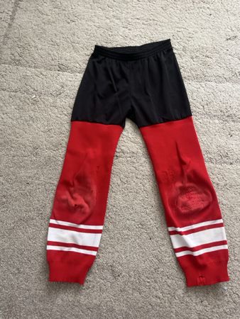 Eishockey Stulpen rot/weiss/schwarz Grösse M guter Zustand