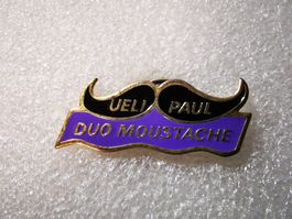 Ansteckpin 6: Ueli & Paul Duo Moustache
