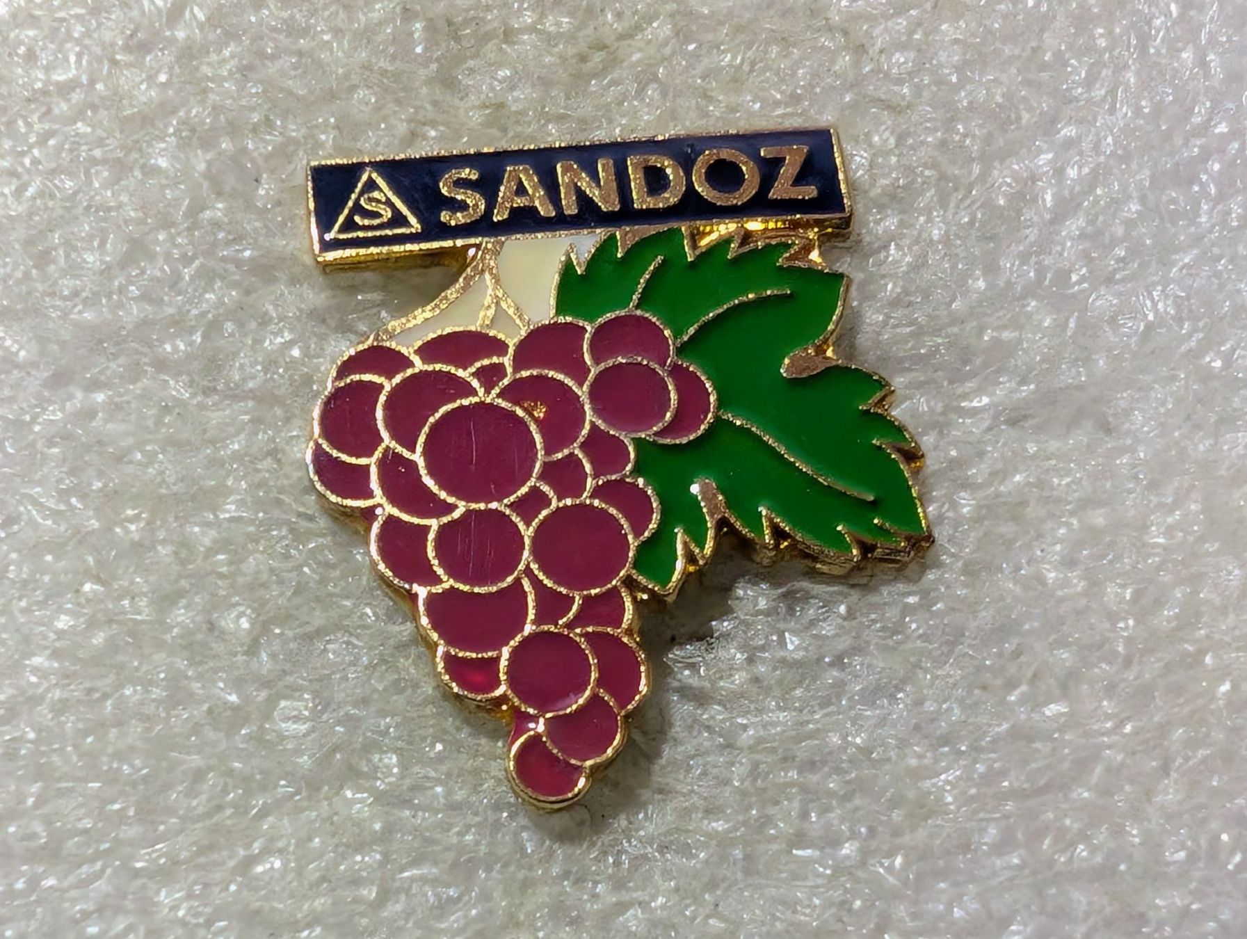 Placchette & Badge: Ansteckpin 186: Sandoz – Usato da Oppligen venduto da Pin-Fall-Shop