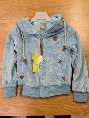 Neue, flauschige Mädchen Jacke, hellblau, Grösse 104