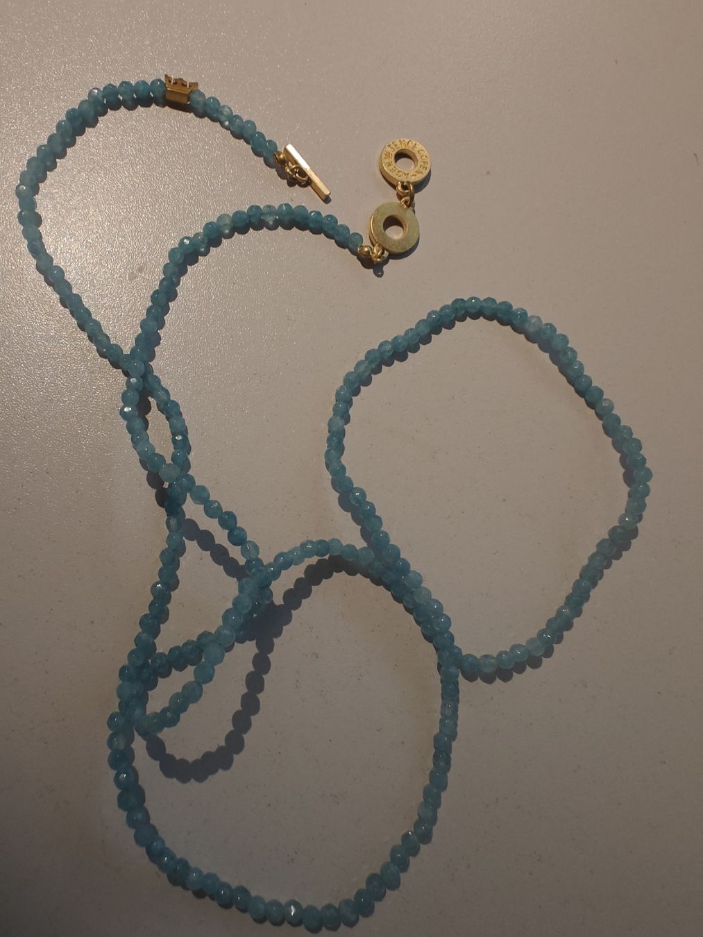Sence Catenine: Sence Kette türkis mit Goldverschluss – Usato da Menzingen venduto da tschey-tschey 1