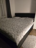 Doppelbett Kunstleder schwarz mit Stauraum gebraucht