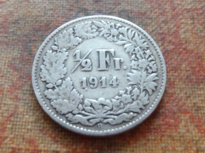 Tutti le monete: 1/2 Fr. 1914  (A) – Usato da Romanel-sur-Lausanne venduto da Swift13