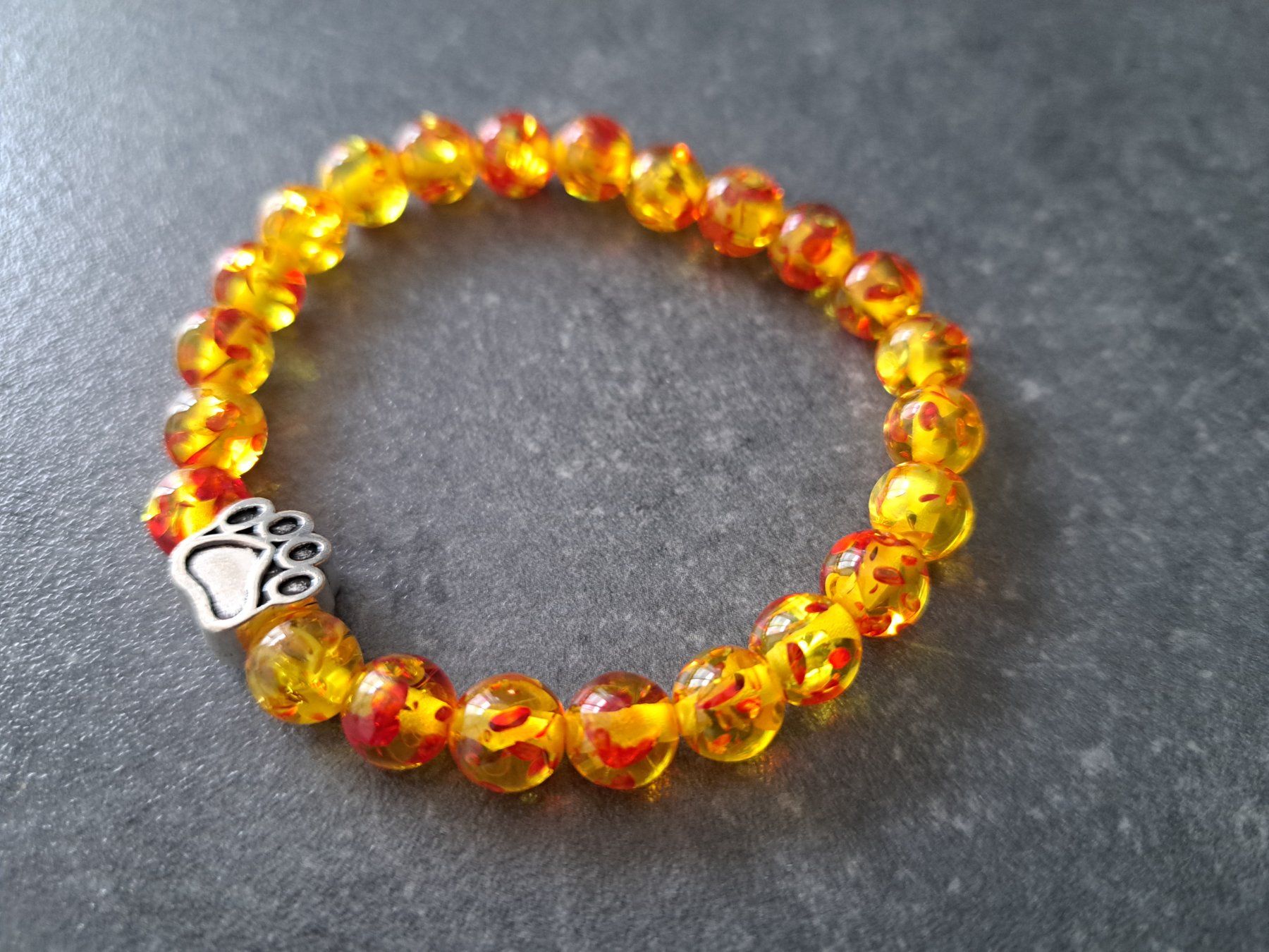 Bracelets: Bracelet ambre fleur – Neuf avec emballage d'origine à St-Imier par supernova21