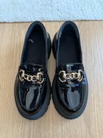 Black loafers