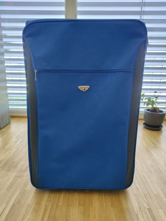 Grande valise en tissu bleu 