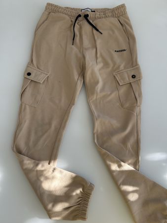 Pantalon cargo Raizzed, taille 14/164, couleur beige.