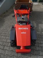 Bucher M600 Einachser mit 2 Anhängern