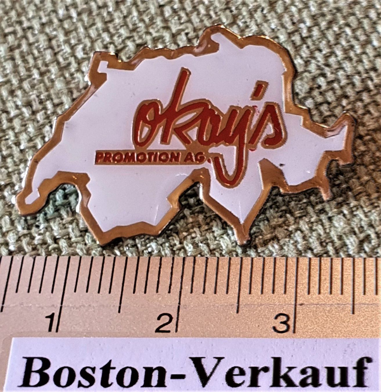 Placchette & Badge: D470 - Pin Schweiz Promotion AG Okay's – Usato da Reinach BL venduto da Boston-Verkauf 1